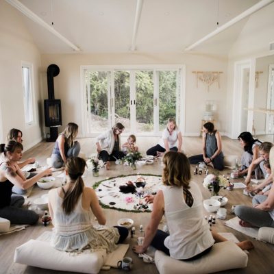 women-around-circle-in-yoga-retreat-2024-06-28-18-20-41-utc